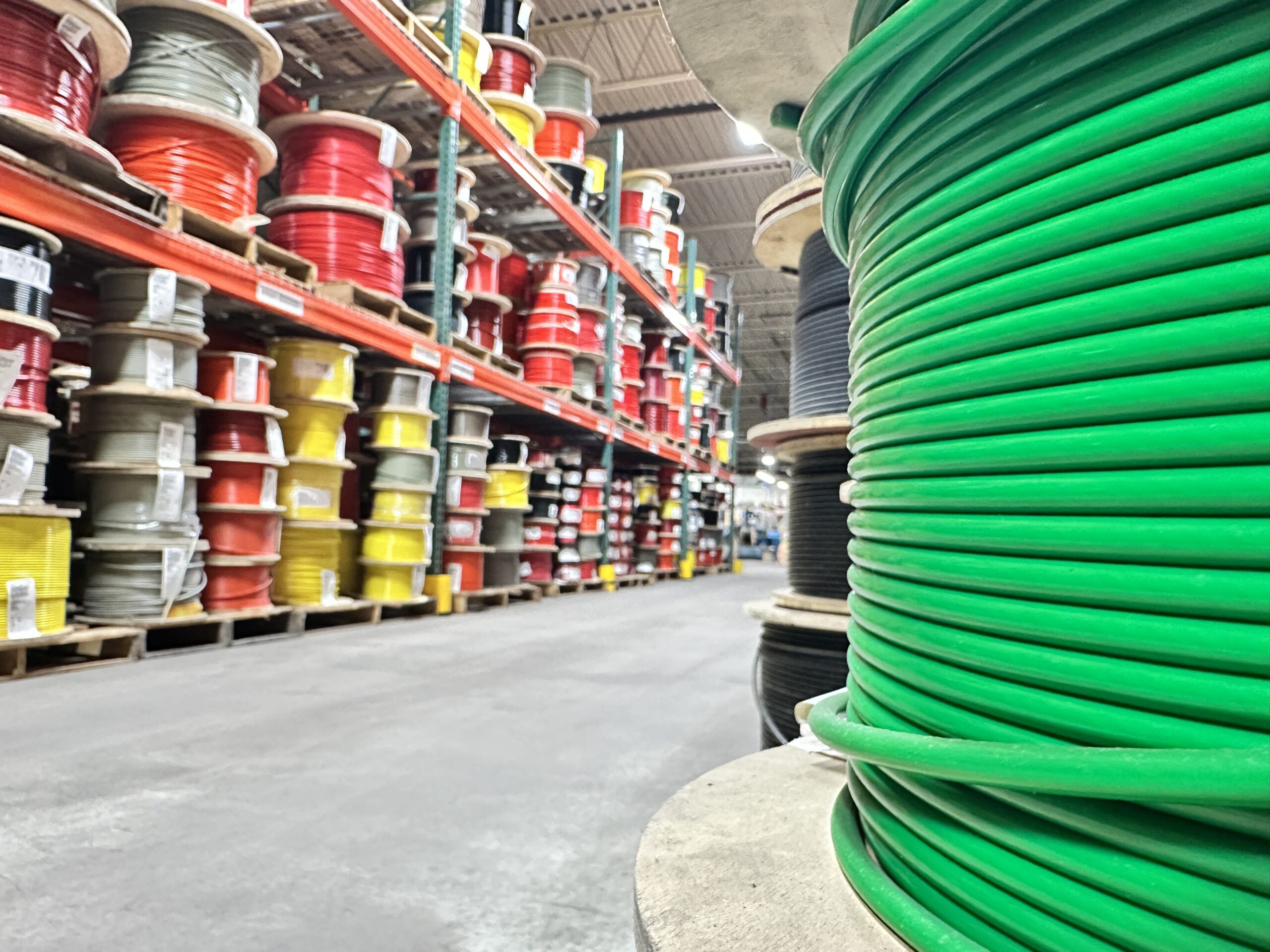 Coated cable spools in large warehouse