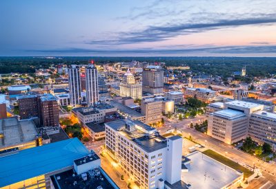 Peoria, Illinois, USA downtown skyline from above at dusk.